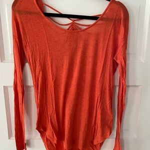 Beautiful cotton top with open detailed back - has a little bit of stretch.